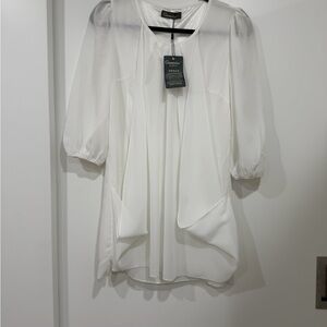 Chic White Blouse by [Brand]
